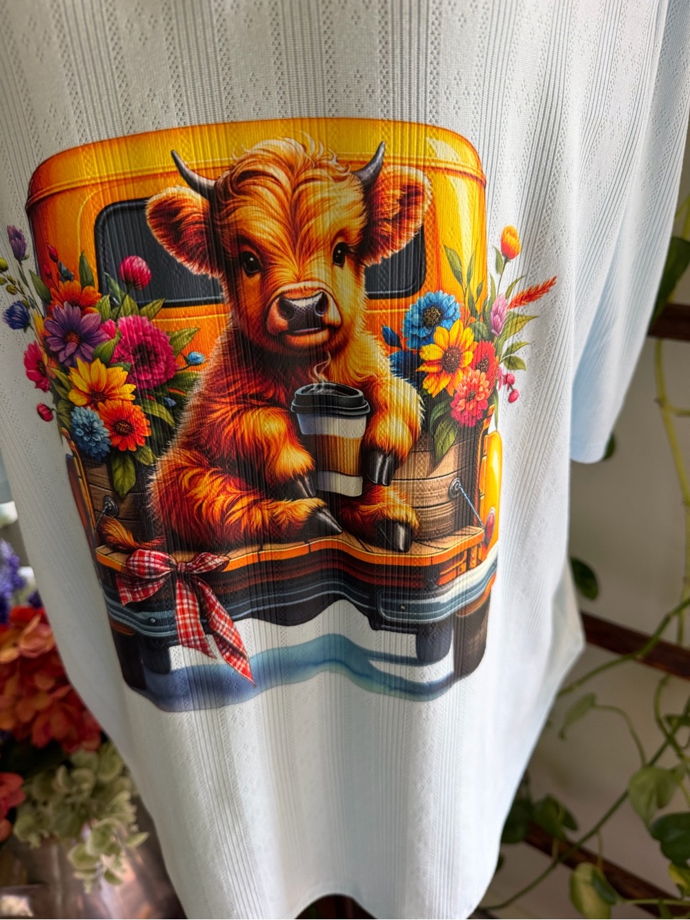 Light Blue V-Neck Tee with Colorful Cow Graphic